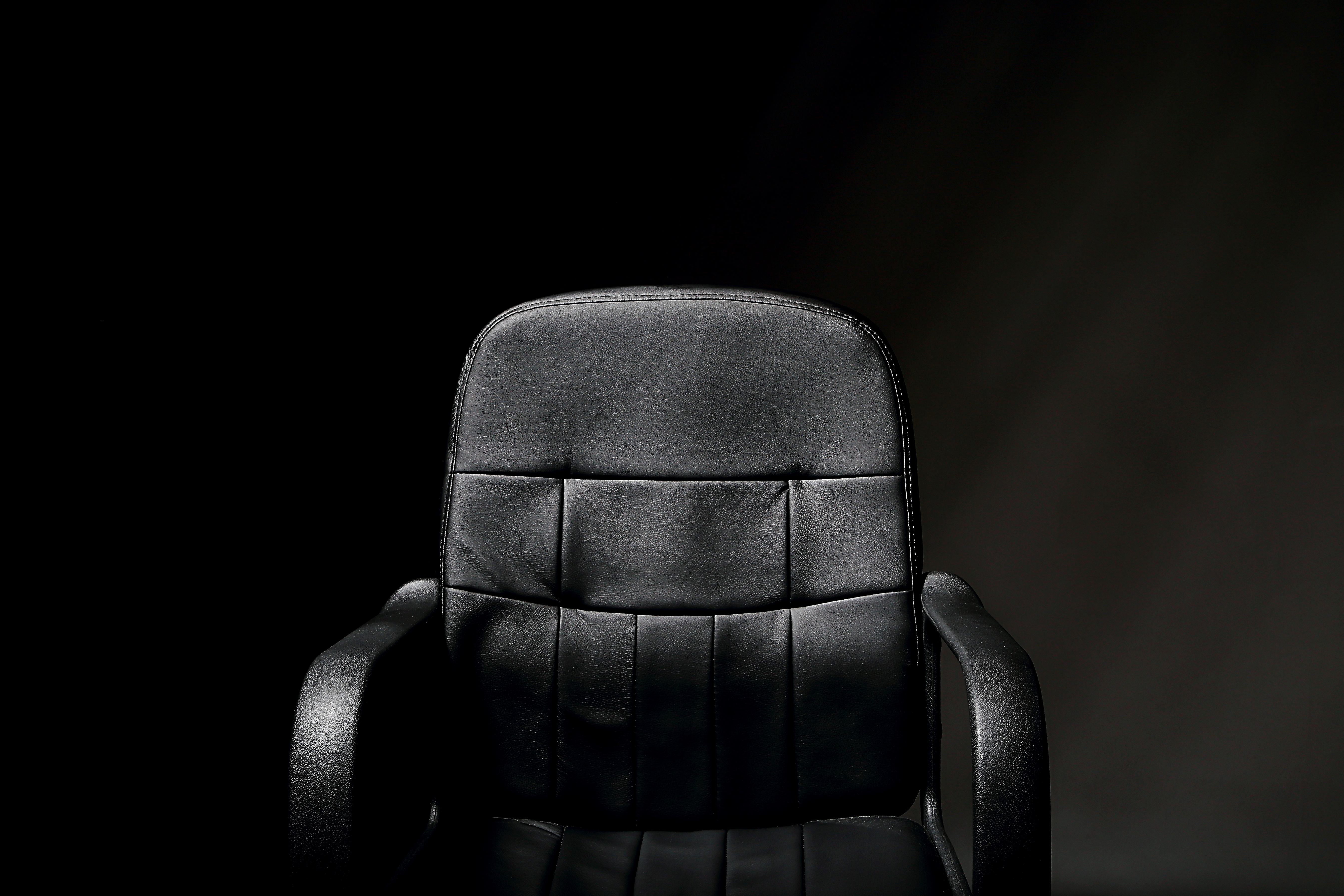 Empty Black Leather Office Chair.jpg